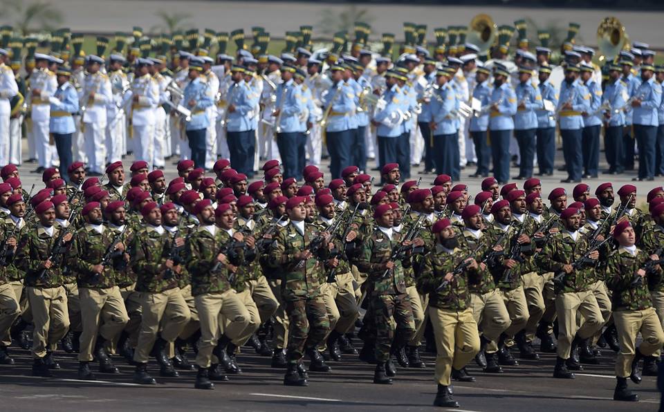 13 - Pakistani troops from the Special Services Group SSG march during Pakistan Day Military Parade