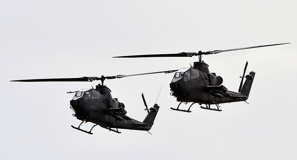 35 - Cobra helicopters fly past during the Pakistan Day military parade in Islamabad on March
