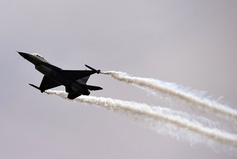 45 - An F-16 fighter performs a flypast during the Pakistan Day military parade in Islamabad