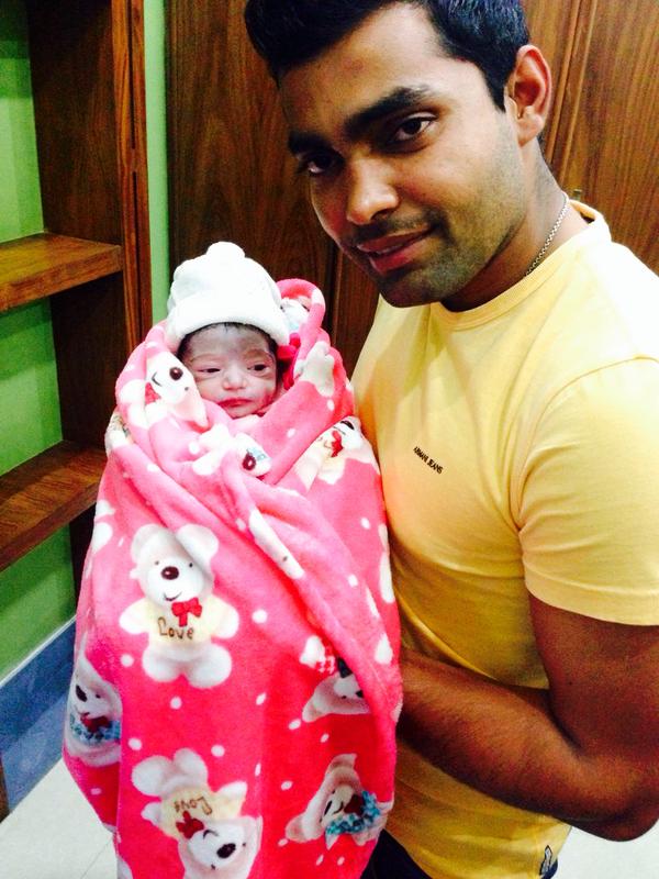 Umar Akmal with his daughter