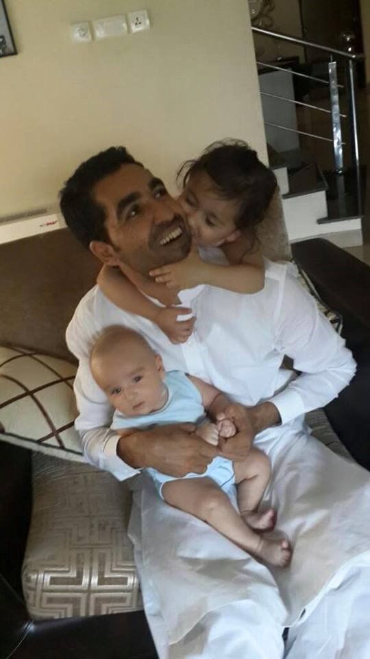Umar Gul with his kids