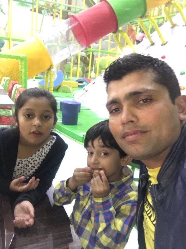 Kamran Akmal with his kids