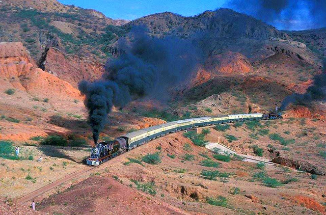 22 - Pakistan Railways train with dual steam locomotives passing between Dandot and Malikwal in the Salt Range.